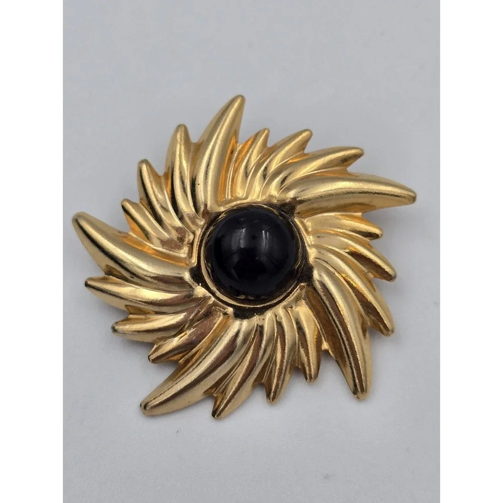 Vintage Gold Tone Swirl Sunburst Brooch Pin with Black Cabochon Center 1980s 90s